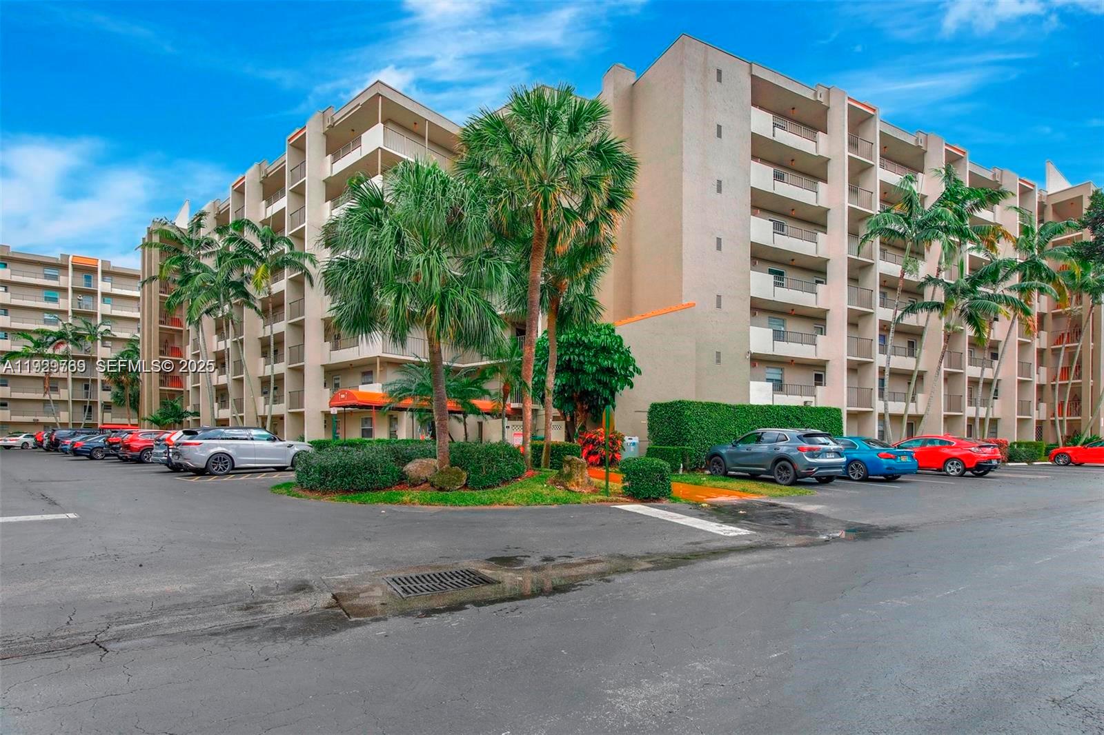 3930 Inverrary Boulevard, Unit 405D Lauderhill, FL 33319 - Photo 42 of 46 a front view of a building with street view