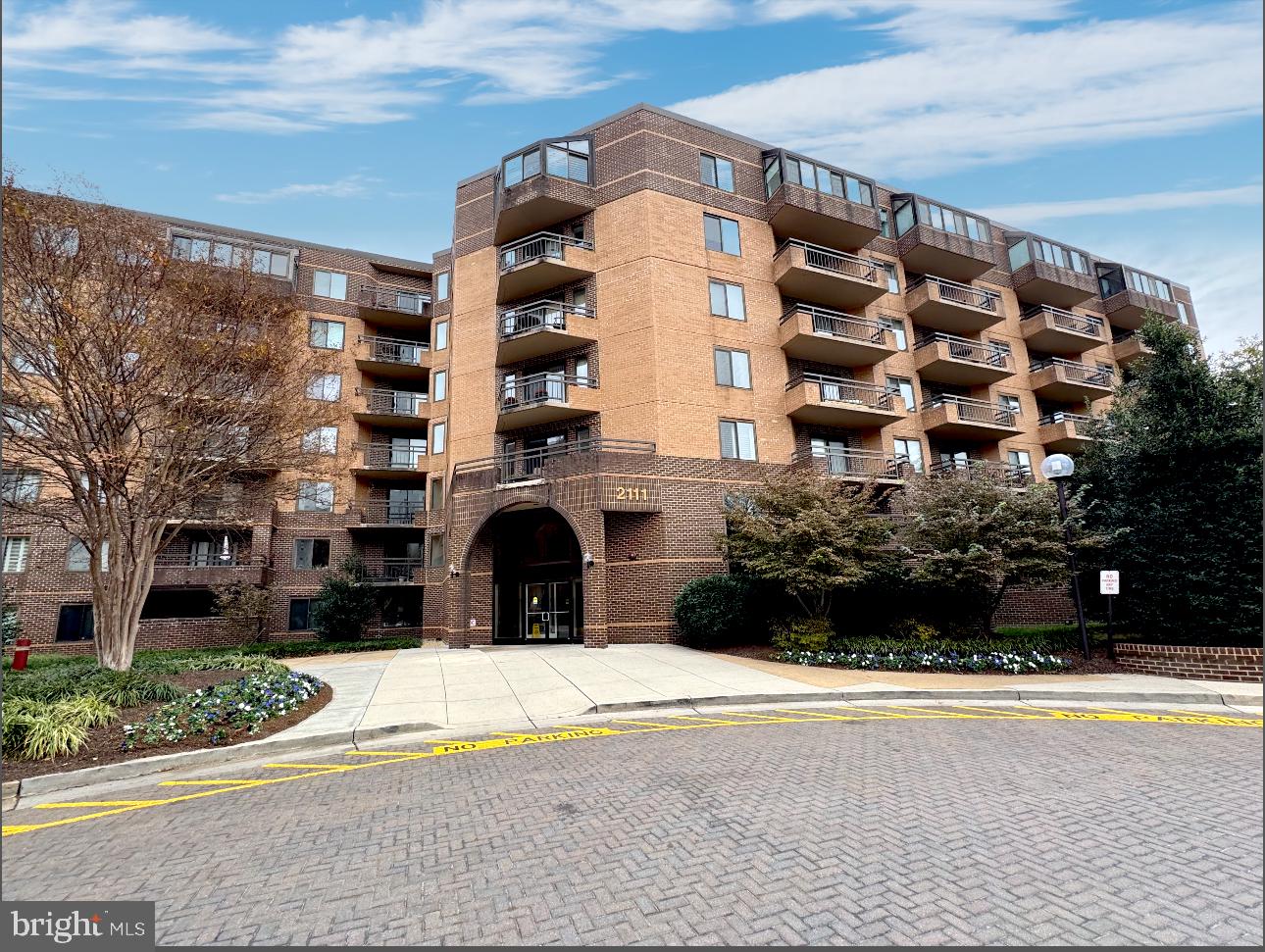 2111 Wisconsin Avenue Northwest, Unit 504 Washington, DC 20007 - Photo 1 of 17 a view of a building with a yard