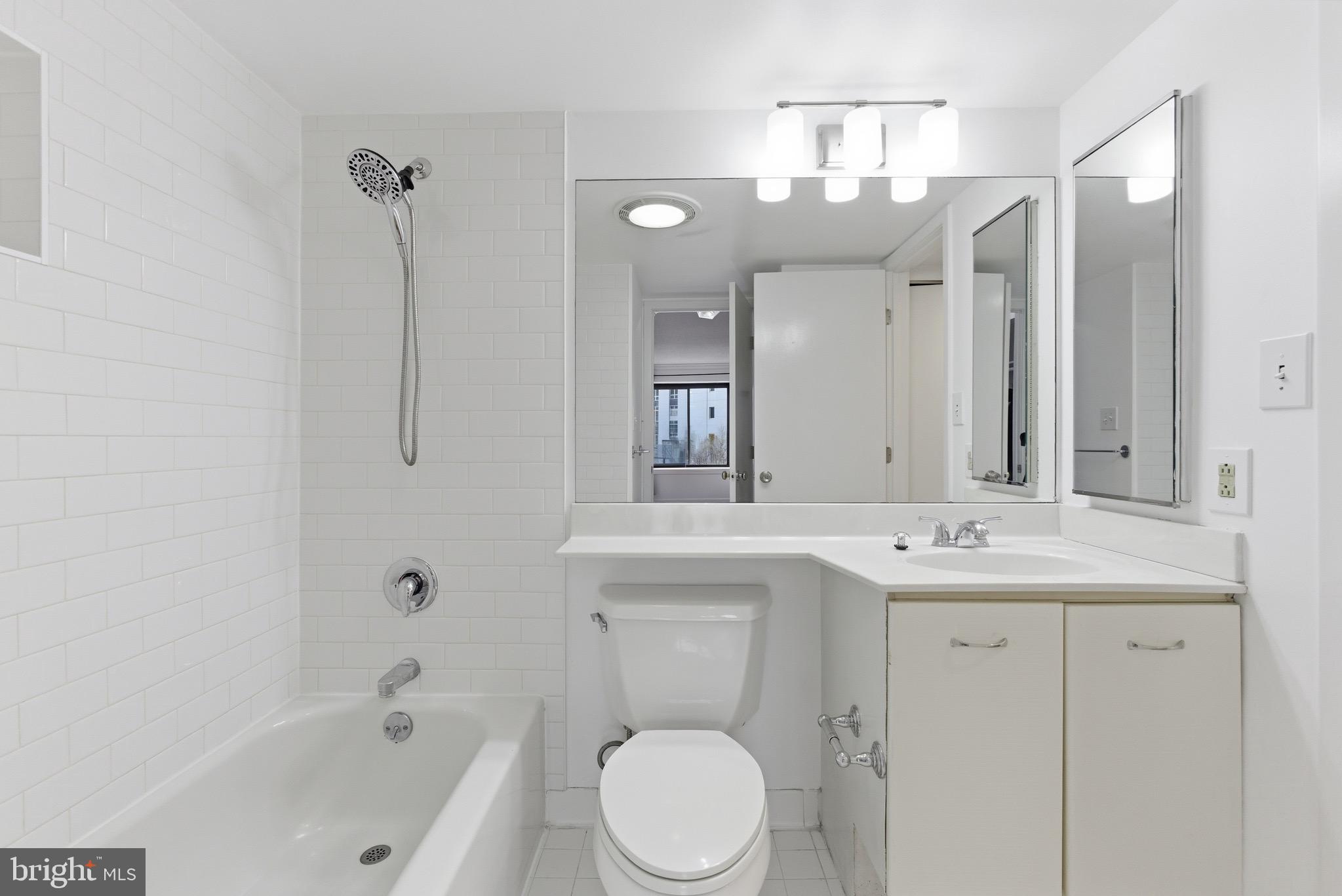 2111 Wisconsin Avenue Northwest, Unit 504 Washington, DC 20007 - Photo 17 of 17 a bathroom with a sink a toilet and shower