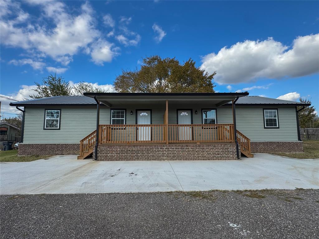 216 Smith Circle, Unit 1 Point, TX 75472 - Photo 1 of 15 a front view of a house