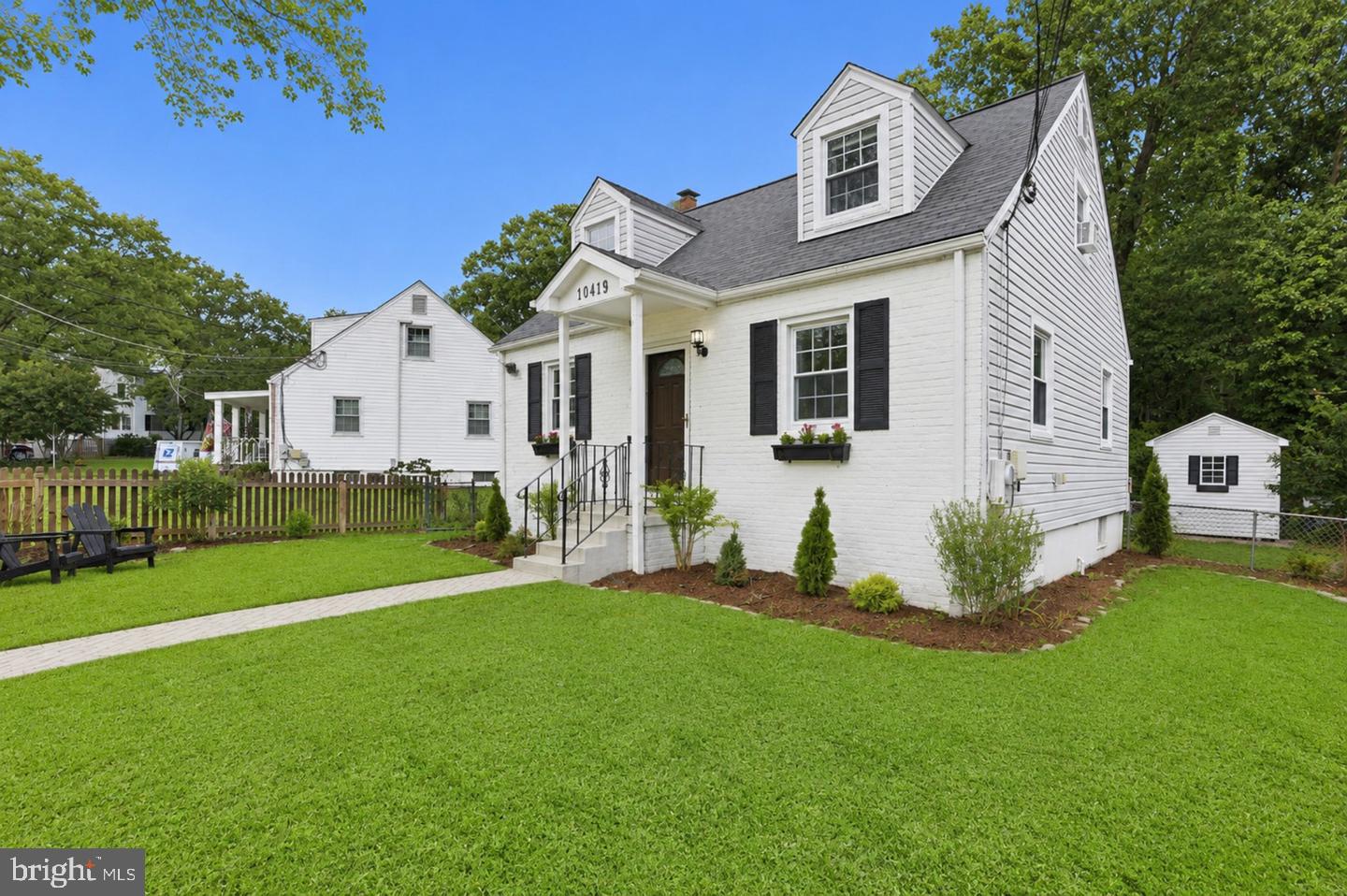 10419 Grandin Road Silver Spring, MD 20902 - Photo 43 of 45 Charming home with lush green yard.