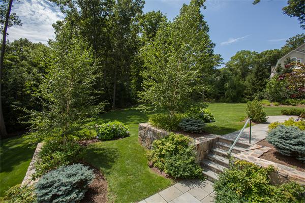 22 Wachusett Road Wellesley, MA 02481 - Photo 24 of 29 a view of a garden with large trees