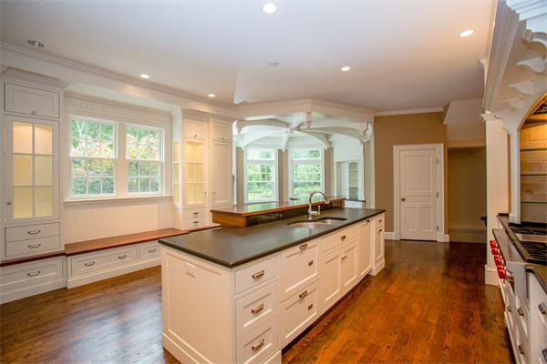 22 Wachusett Road Wellesley, MA 02481 - Photo 8 of 29 a large bathroom with double vanity and a large mirror