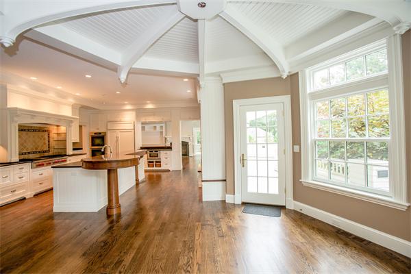 22 Wachusett Road Wellesley, MA 02481 - Photo 10 of 29 a kitchen with a sink appliances wooden floor and a large window