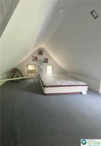 a view of empty room with windows