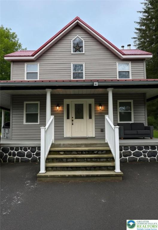 1215 Seese Hill Road Canadensis, PA 18325 - Photo 2 of 19 a front view of a house with a garage