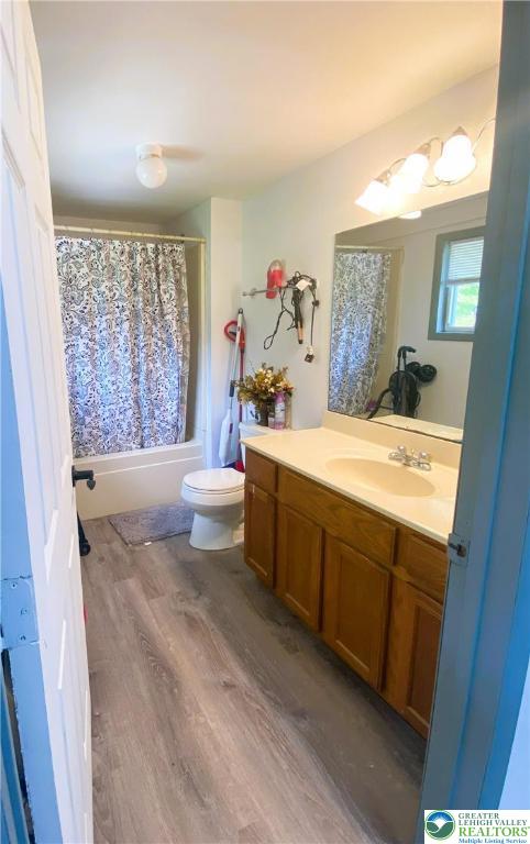 1215 Seese Hill Road Canadensis, PA 18325 - Photo 9 of 19 a bathroom with a sink vanity mirror bathtub and next to a window