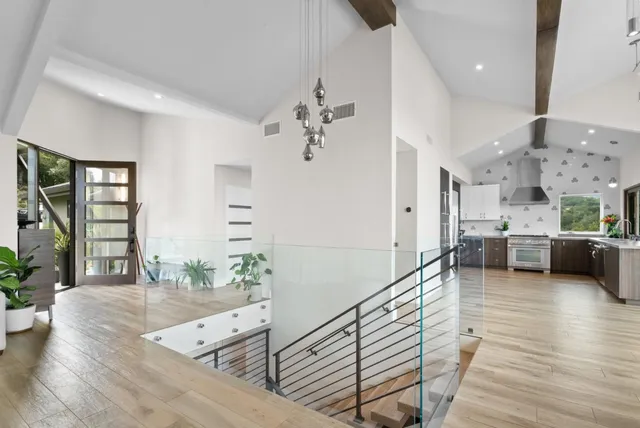 a very nice looking living room with a large window