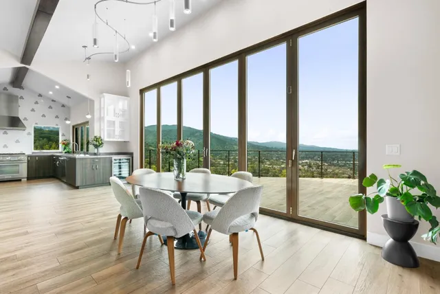 a kitchen with a refrigerator and a sink
