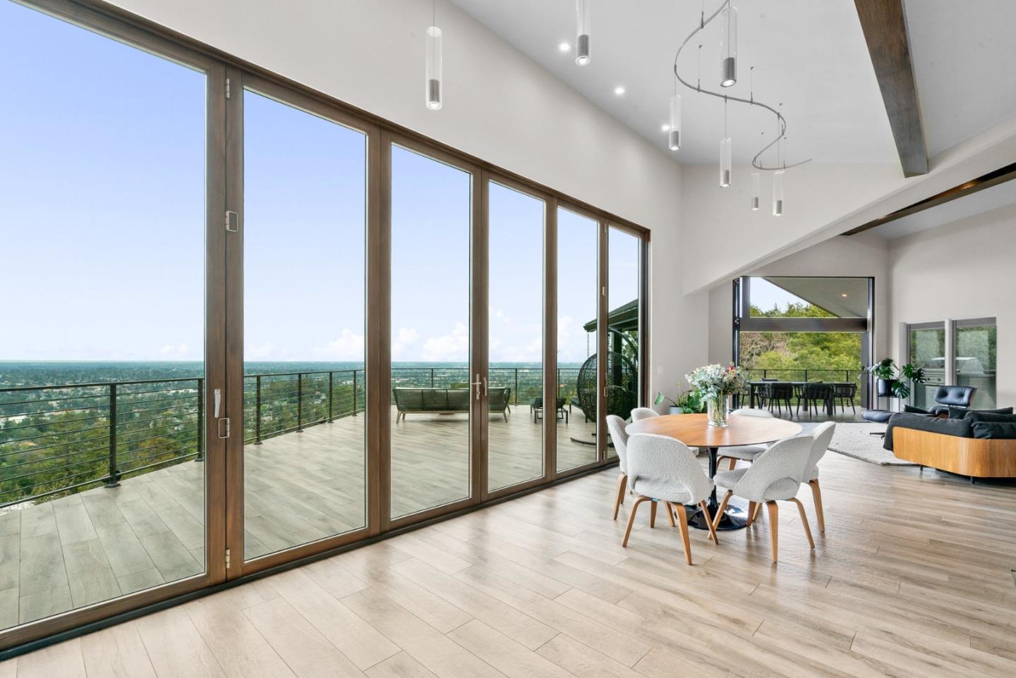 17808 Tourney Road Los Gatos, CA 95030 - Photo 22 of 111 a dining room with furniture a chandelier and wooden floor