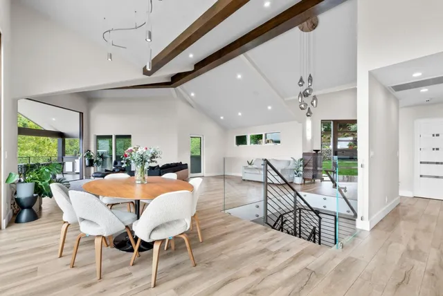 a view of walk in closet with wooden floor