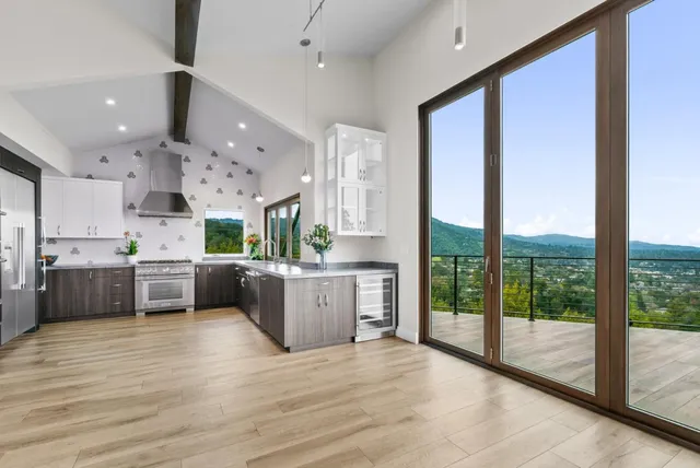 a bathroom with a shower and a curtain