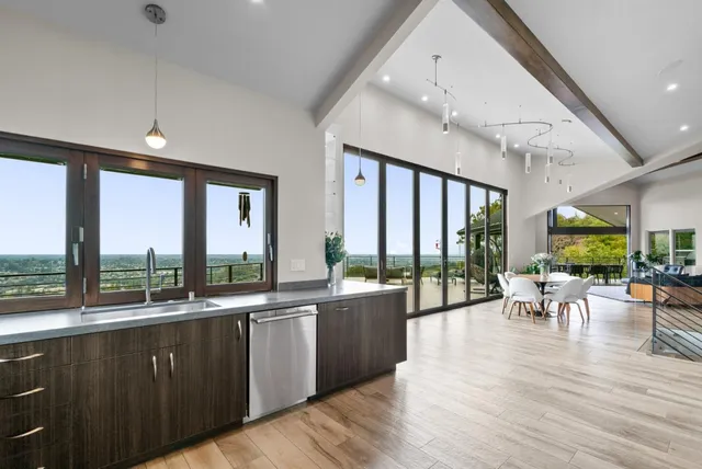 a spacious bathroom with a double vanity sink and a mirror