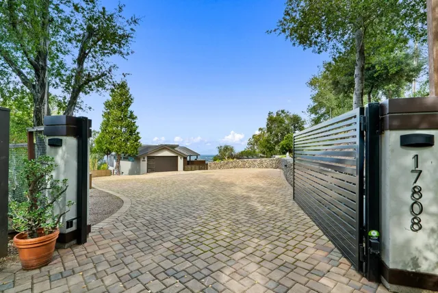 a view of entryway with wooden floor and windows