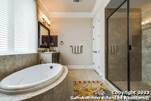 a view of a livingroom with furniture and a flat screen tv