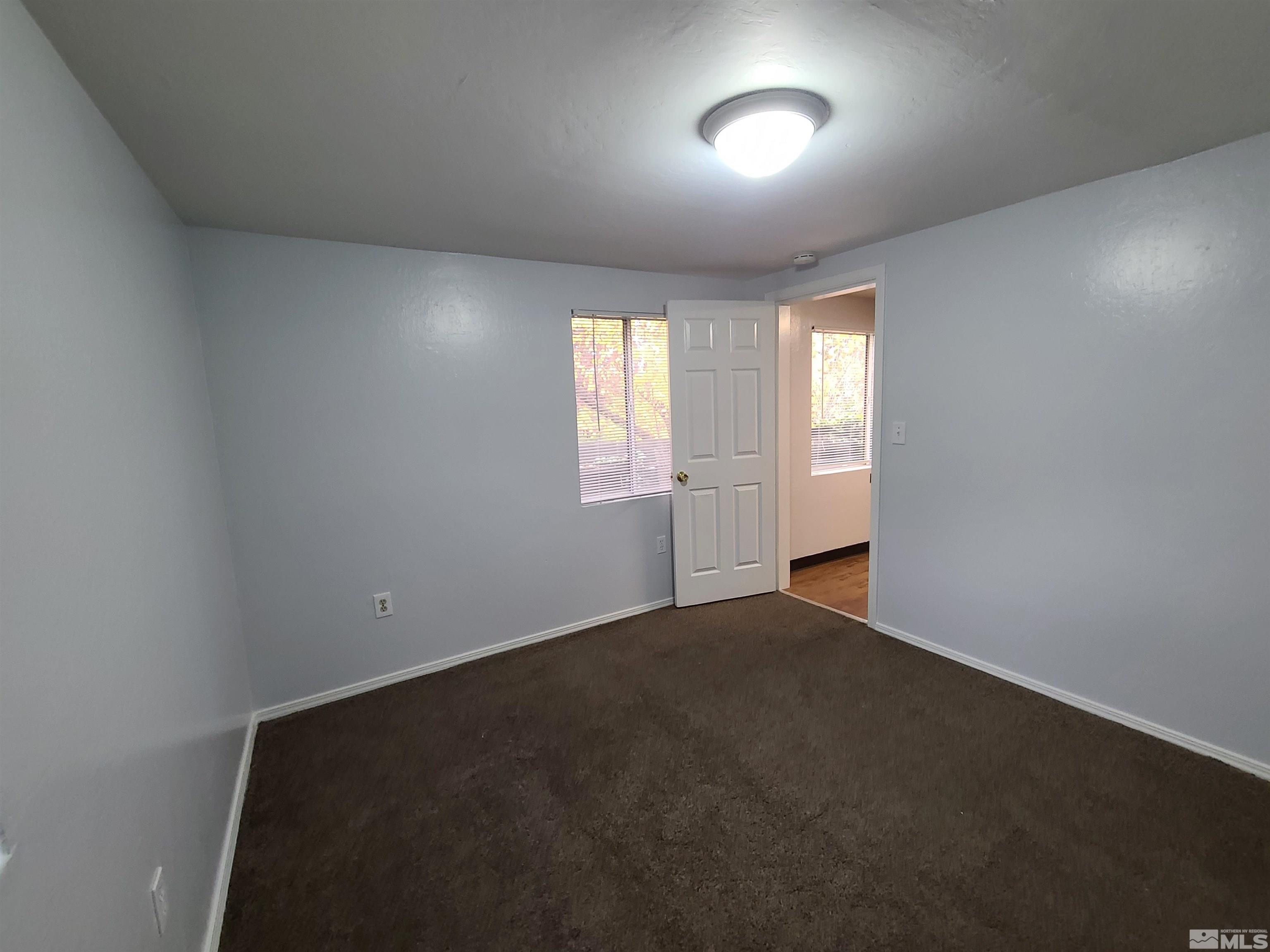 824-828 Locust Street Reno, NV 89502 - Photo 16 of 38 an empty room with windows