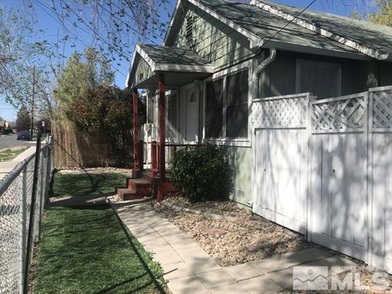 824-828 Locust Street Reno, NV 89502 - Photo 2 of 38 a view of a house with a yard