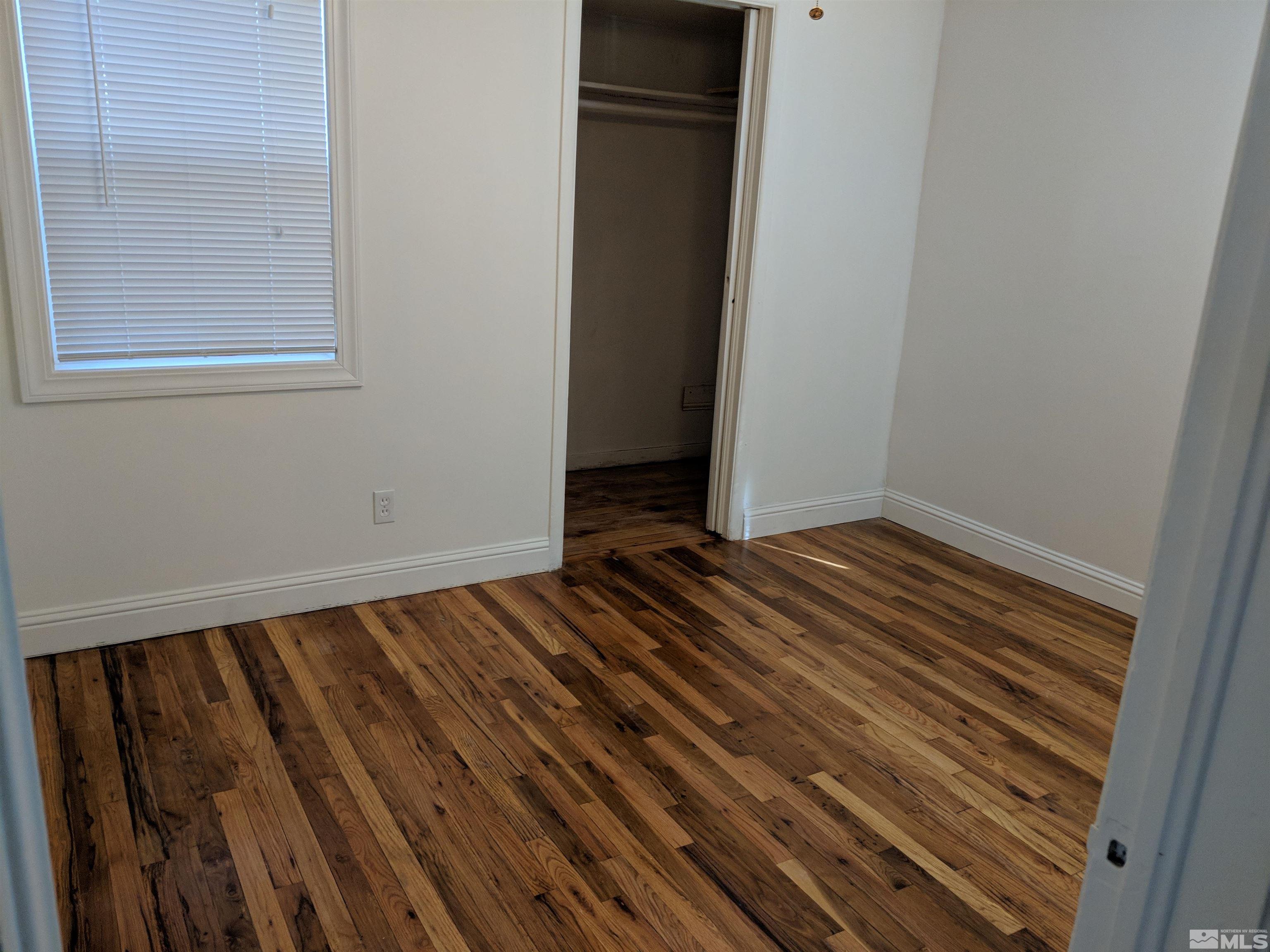 824-828 Locust Street Reno, NV 89502 - Photo 26 of 38 a view of a room with wooden floor