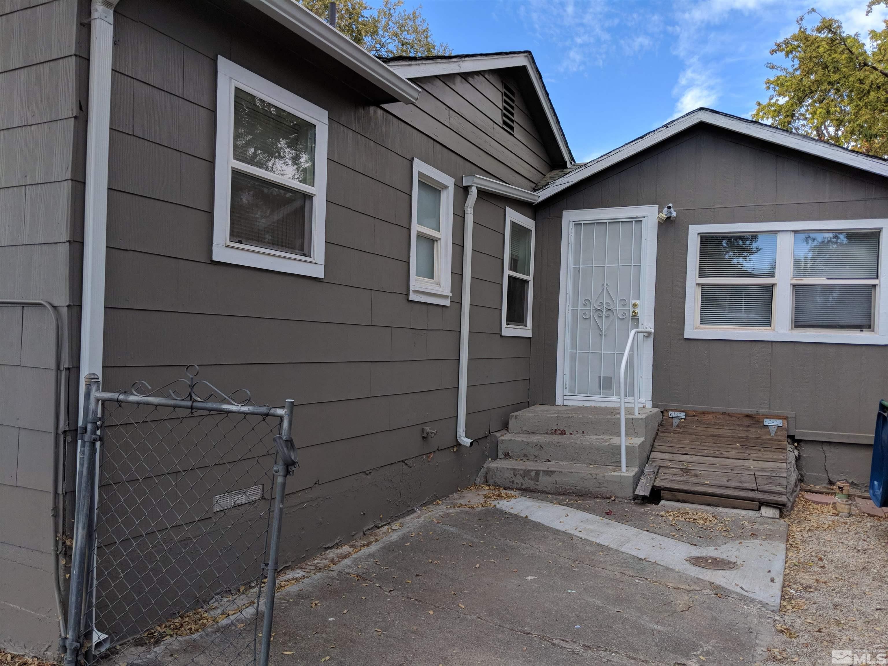 824-828 Locust Street Reno, NV 89502 - Photo 35 of 38 a view of house with seating space