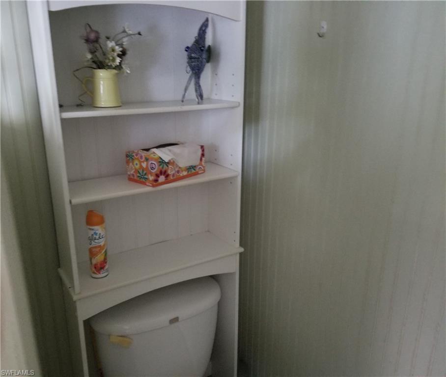 4914 Coach Lane Naples, FL 34114 - Photo 10 of 12 Bathroom with toilet