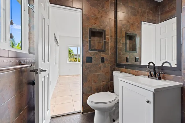 a view of swimming pool with chairs