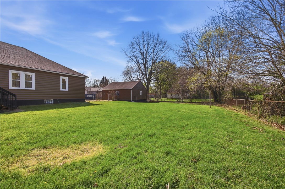 1925 Sunset Avenue Springfield, OH 45505 - Photo 41 of 45 Expansive green space offers a serene private yard, perfect for outdoor activities and relaxation.