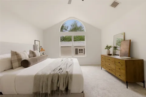 a kitchen with a stove a sink and a microwave