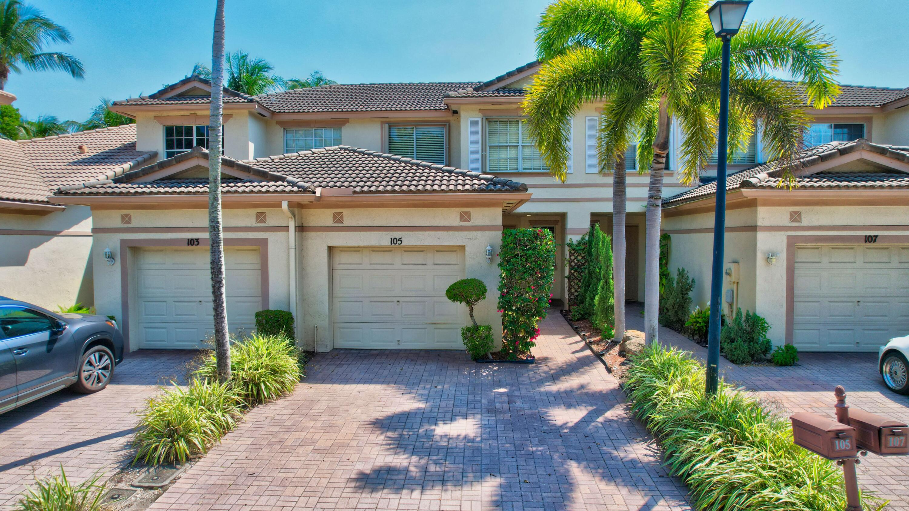 105 Coconut Key Lane Delray Beach, FL 33484 - Photo 1 of 24 Front of the House
