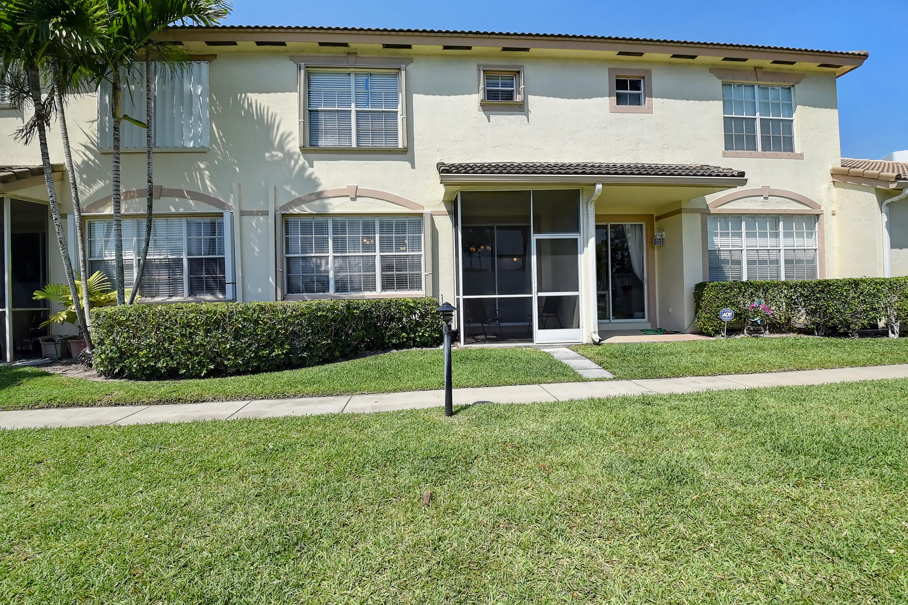 105 Coconut Key Lane Delray Beach, FL 33484 - Photo 19 of 24 View of Townhome from the Back