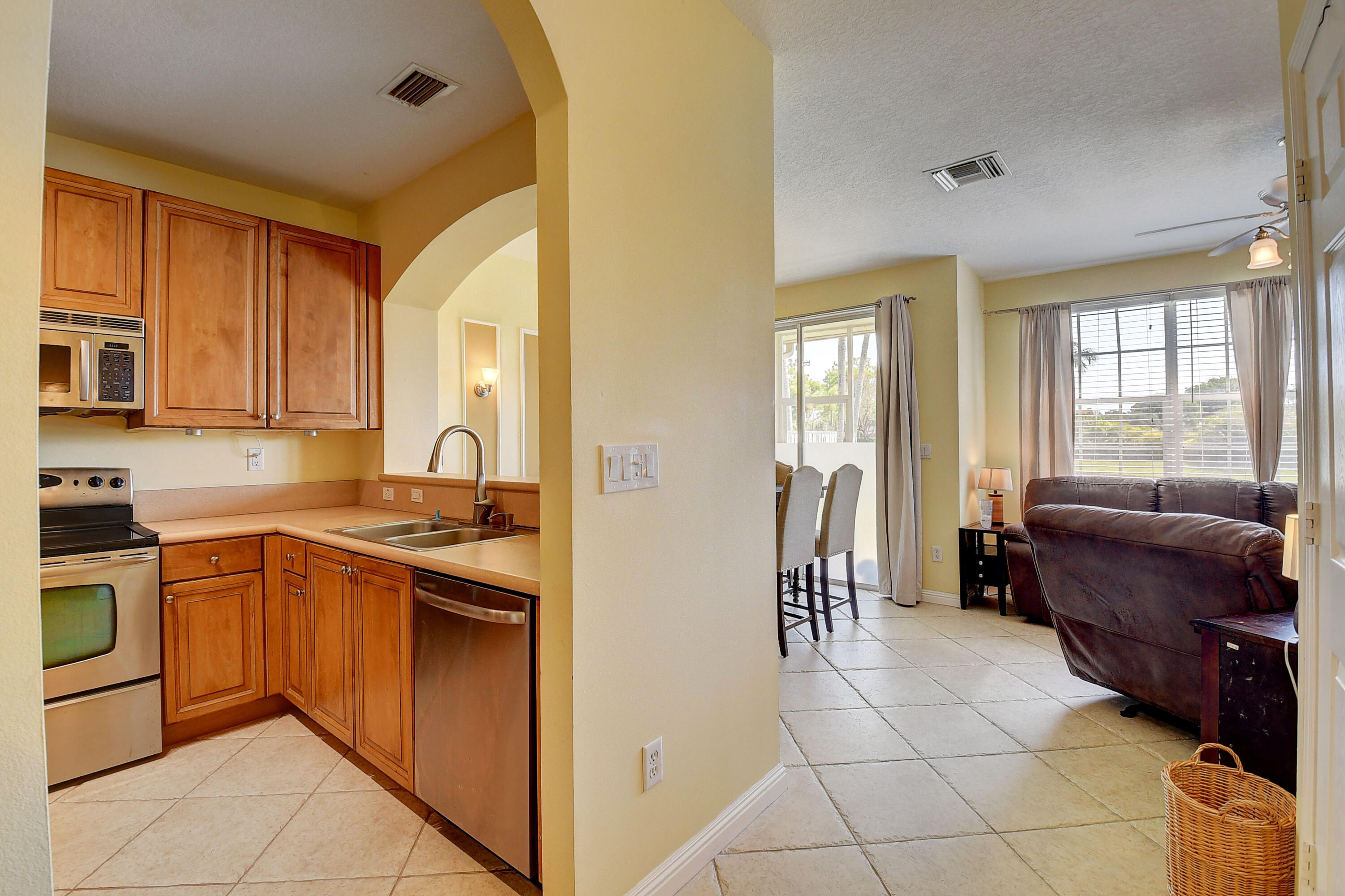 105 Coconut Key Lane Delray Beach, FL 33484 - Photo 3 of 24 Kitchen & Living Room