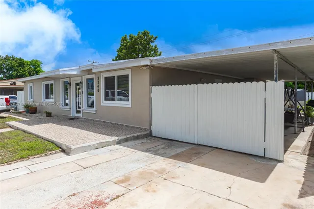 a view of a house with a patio