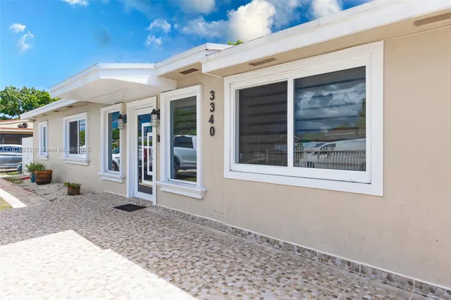 a front view of a house with porch