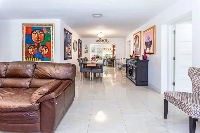 a living room with furniture and a couch