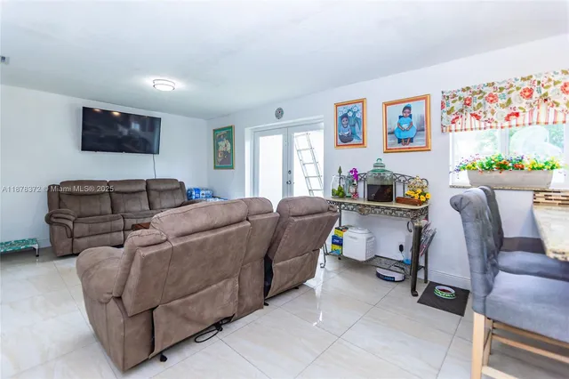 a living room with furniture and a couch