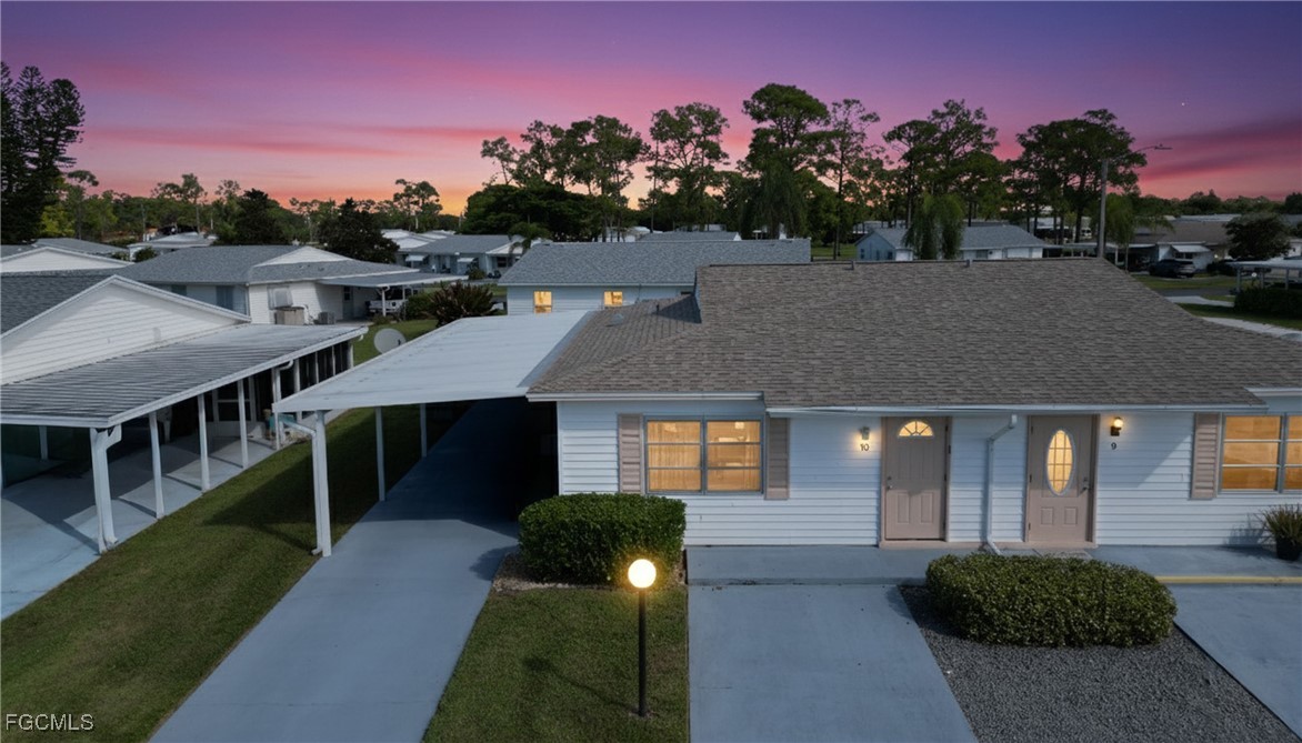 a aerial view of a house with a yard