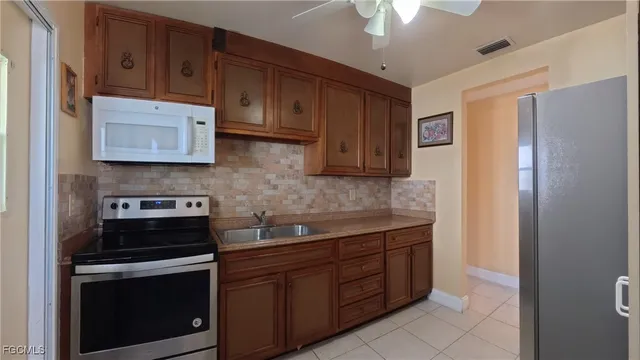 $1,300 | 10 Dawn Flower Circle, Lehigh Acres, FL 33936