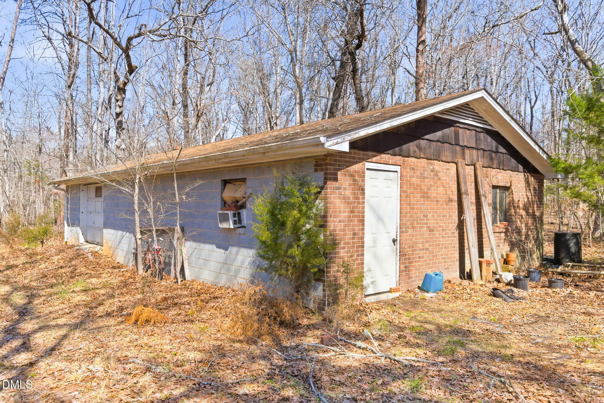 1603 Sykes Road Mebane, NC 27302 - Photo 39 of 45 a backyard of a house with large tree