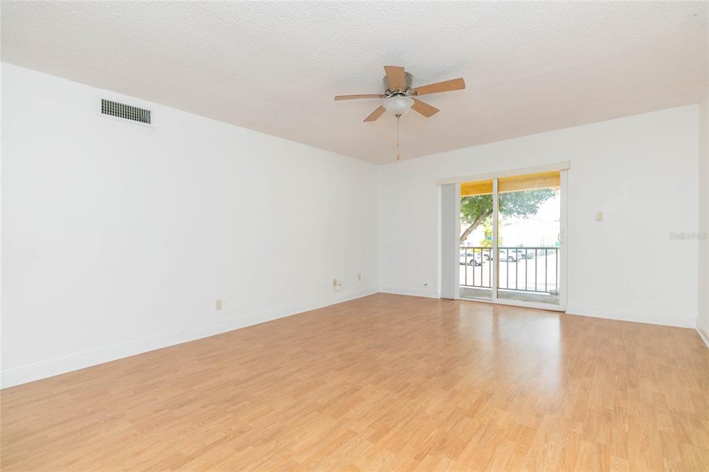 7531 Abonado Road, Unit 1 Tampa, FL 33615 - Photo 4 of 26 a view of an empty room with a window