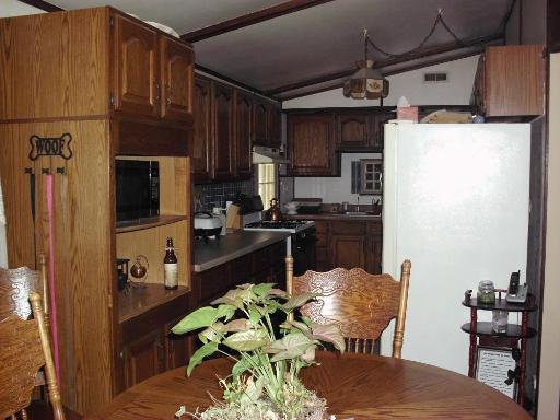 1915 East Clark Street Diamond, IL 60416 - Photo 2 of 14 a view of a kitchen with dining area