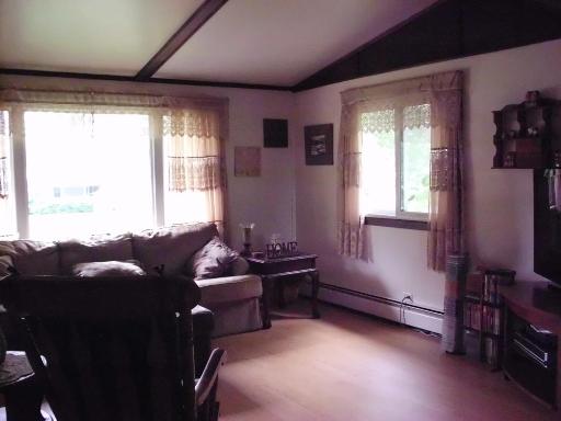 1915 East Clark Street Diamond, IL 60416 - Photo 3 of 14 a living room with furniture and a window