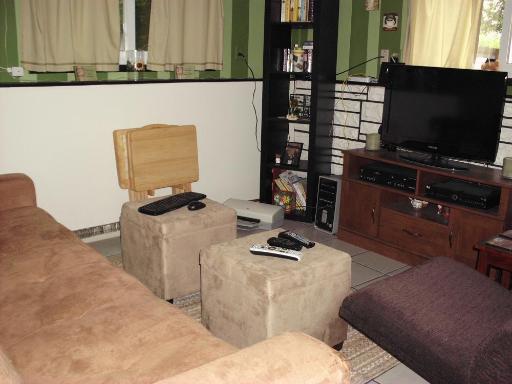 1915 East Clark Street Diamond, IL 60416 - Photo 9 of 14 a living room with furniture and a flat screen tv