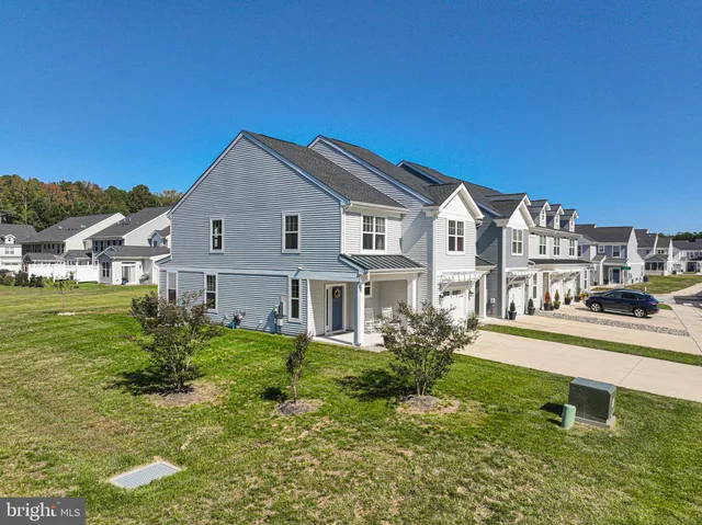 a view of a house with a big yard