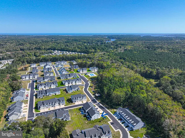 a view of a yard with furniture