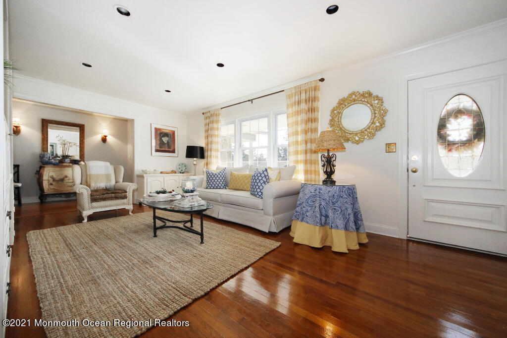 1132 Mohegan Road Manasquan, NJ 08736 - Photo 13 of 35 a living room with furniture and wooden floor