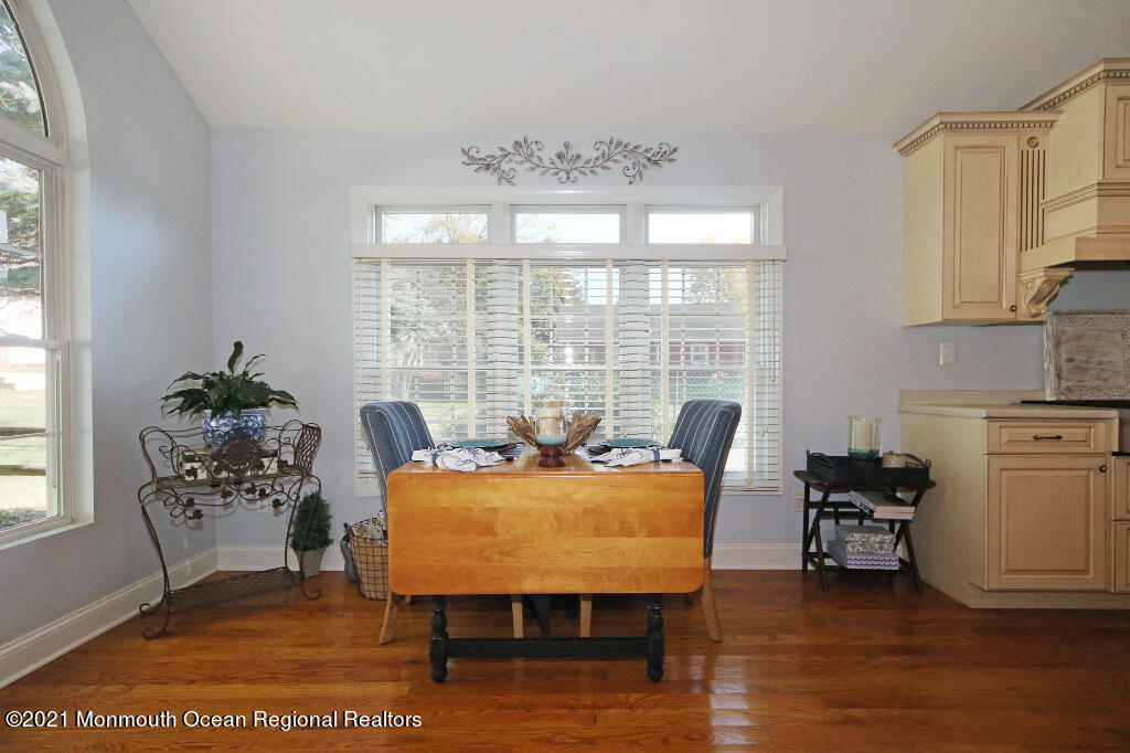 1132 Mohegan Road Manasquan, NJ 08736 - Photo 19 of 35 a living room with furniture and a large window