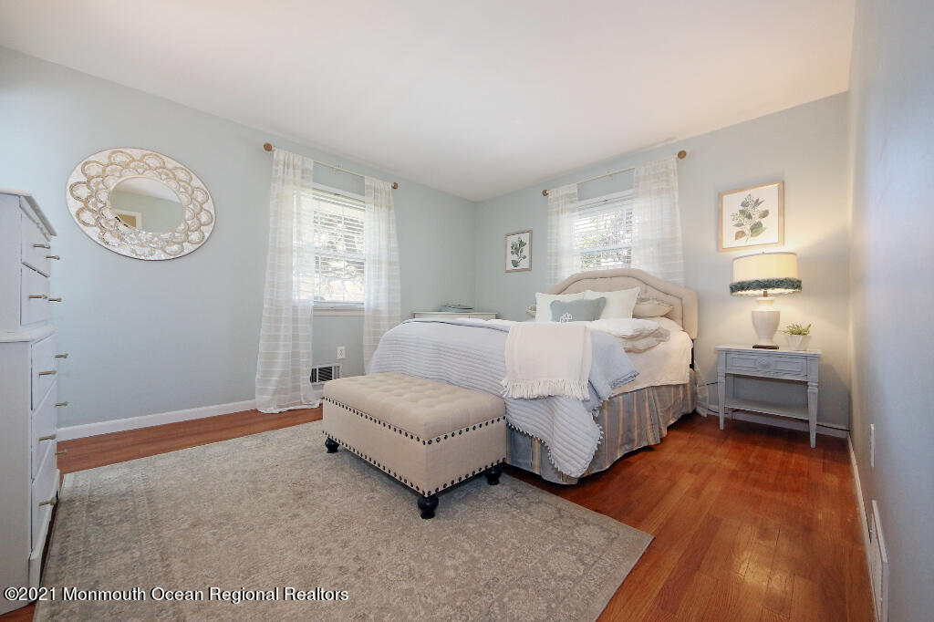 1132 Mohegan Road Manasquan, NJ 08736 - Photo 26 of 35 a bedroom with bed and a window
