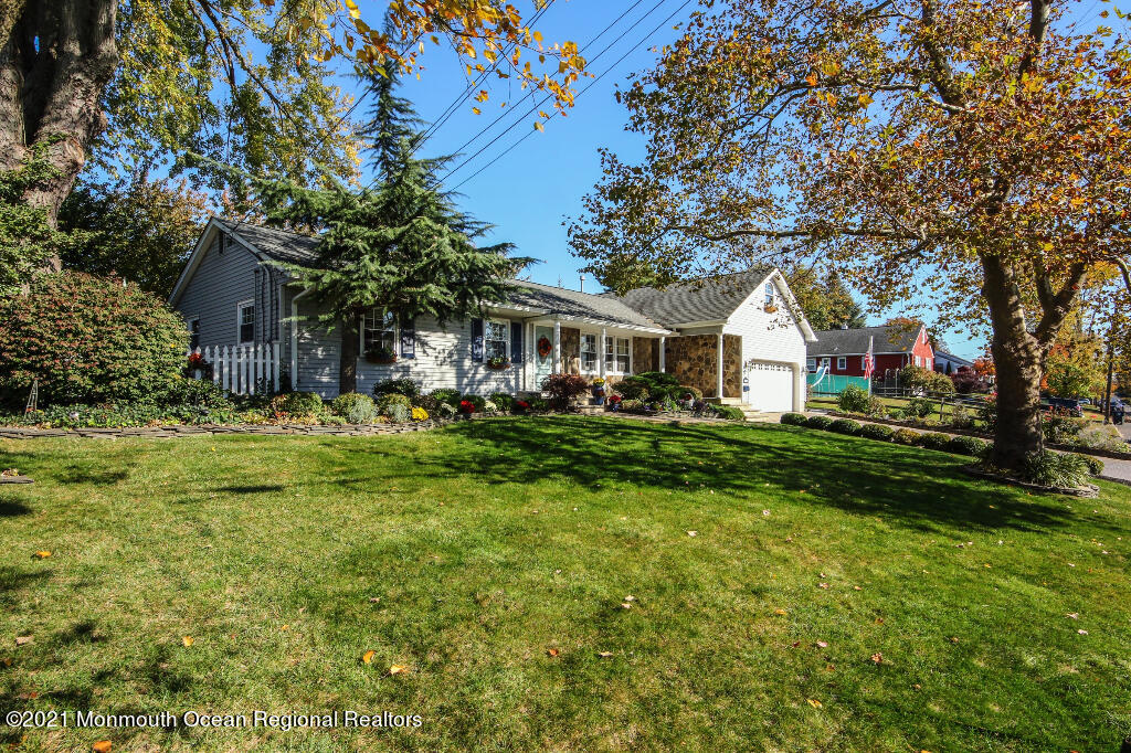 1132 Mohegan Road Manasquan, NJ 08736 - Photo 4 of 35 a view of house with yard and green space