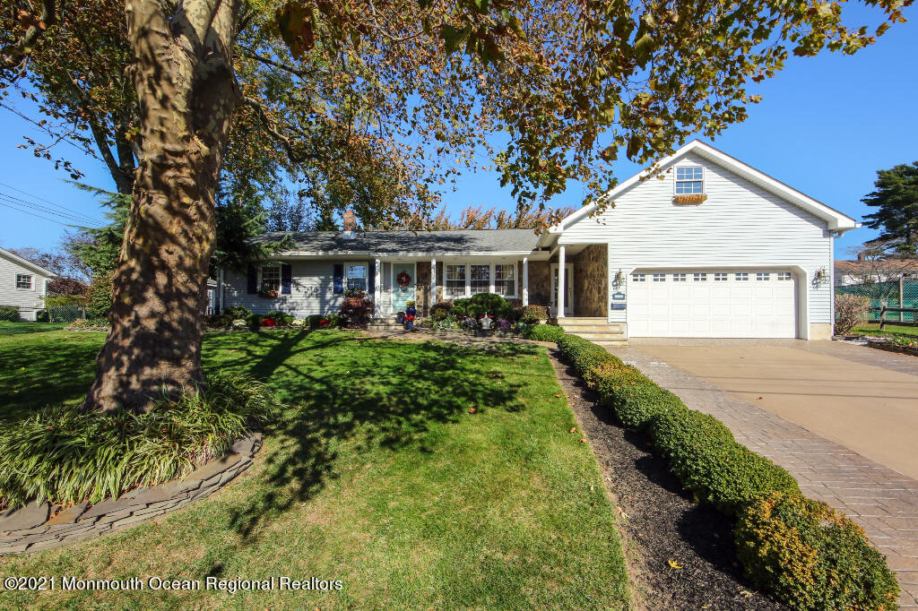 1132 Mohegan Road Manasquan, NJ 08736 - Photo 35 of 35 a view of a house with a yard