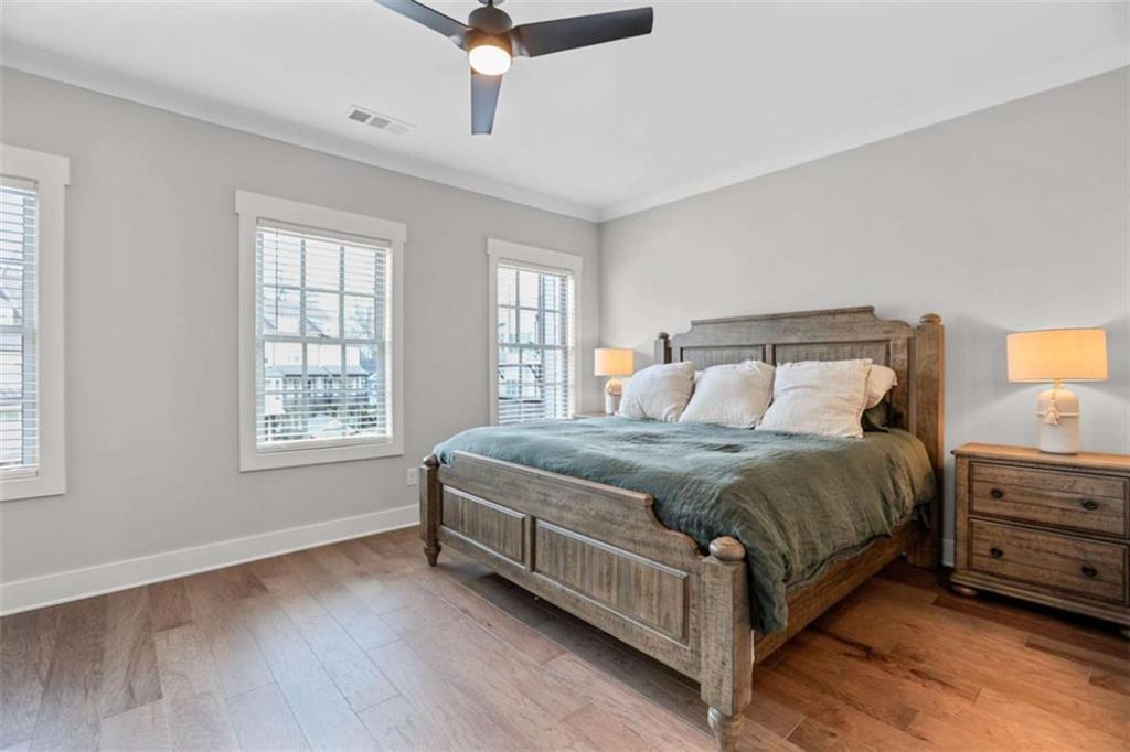 4466 Lemon Street Acworth, GA 30101 - Photo 43 of 65 a bed sitting in a spacious bedroom next to a window