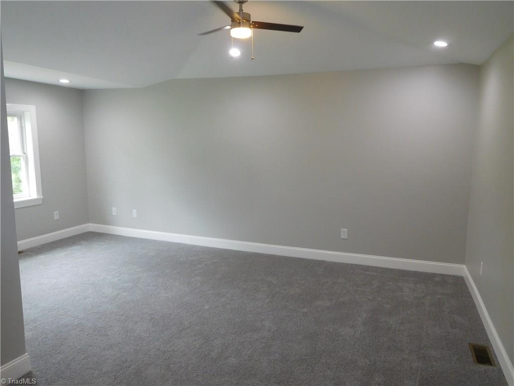 255 Jones Road Winston-Salem, NC 27107 - Photo 11 of 26 Master Bedroom is L shaped, so it has 2 sets of dimensions. New Carpet. Large Room.